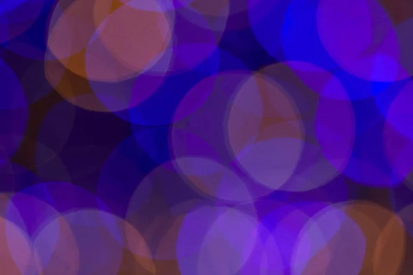 Trendy violet and blue bokeh christmas background — Stock Photo