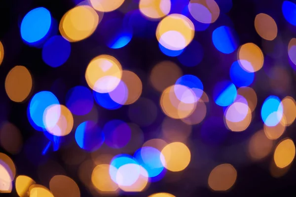 Schöne blaue und gelbe Bokeh Weihnachten Hintergrund — Stockfoto