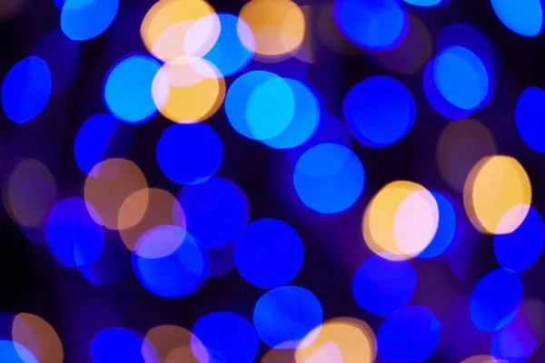 Bright blue and golden bokeh christmas background — Stock Photo