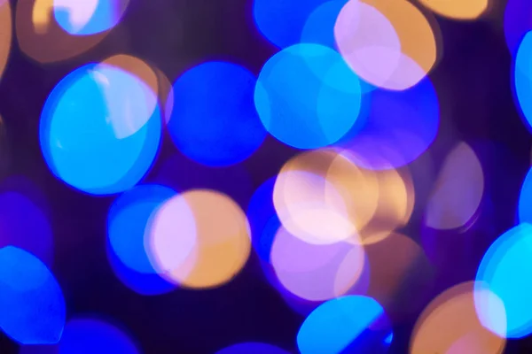 Blue and golden shiny bokeh christmas background — Stock Photo