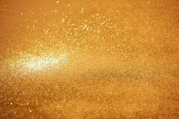 Golden christmas background with shiny glitter — Stock Photo