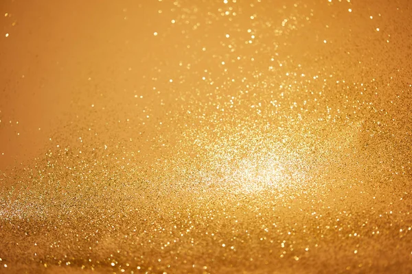 Golden christmas background with glossing sequins — Stock Photo