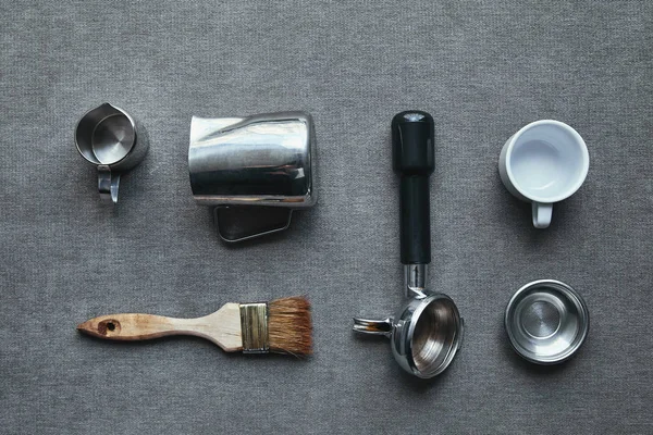 Top view of professional tools for preparing coffee on grey — Stock Photo