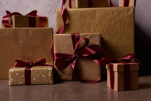 Christmas gift boxes on floor in room — Stock Photo