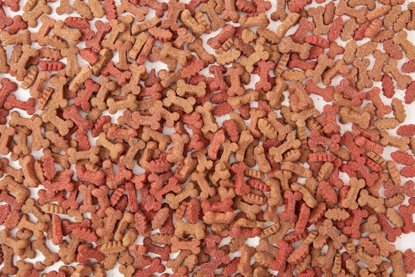 Imagen de marco completo de pila de comida para perros fondo - foto de stock