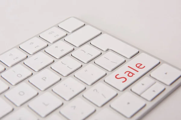 Close-up shot of computer keyboard with black friday button isolated on white — Stock Photo