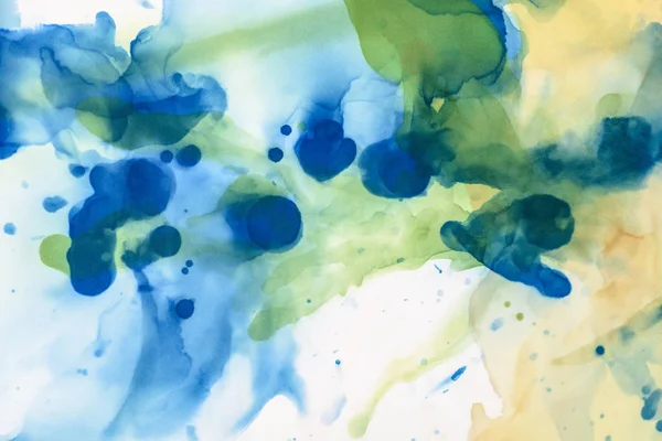 Éclaboussures texturées d'encres alcoolisées vertes et bleues comme fond abstrait — Photo de stock