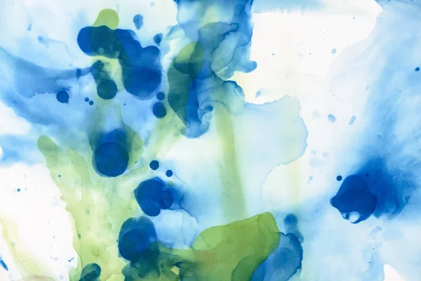 Salpicaduras verdes y azules de tintas de alcohol como fondo abstracto — Stock Photo