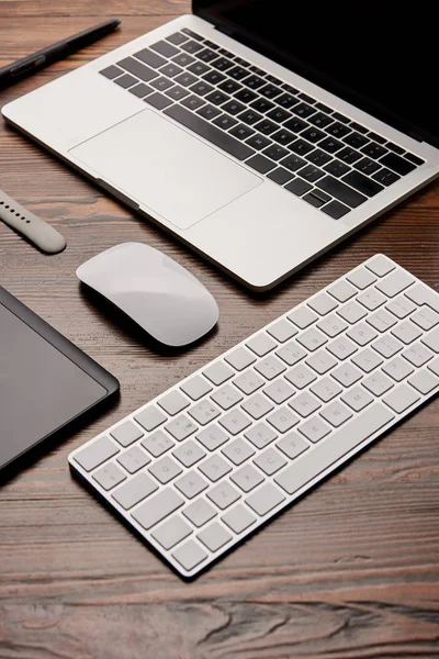 Partial view of various gadgets on graphics designer workplace — Stock Photo