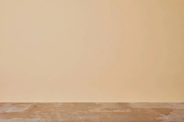 Dusty wooden table isolated on beige background — Stock Photo