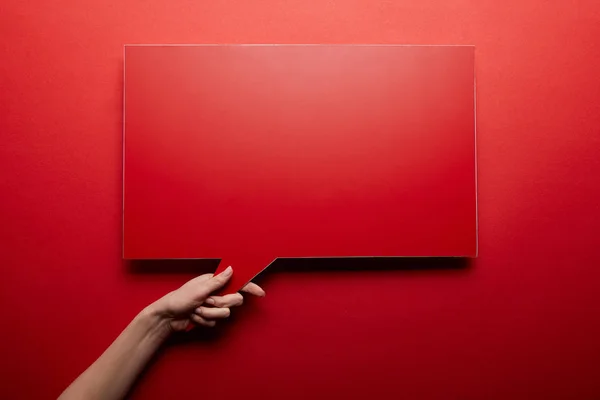 Top view of empty speech bubble in red color on red background — Stock Photo