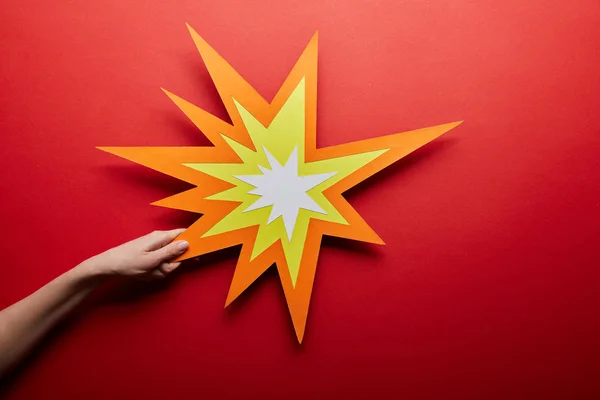 Top view of empty orange bang sign on red background — Stock Photo