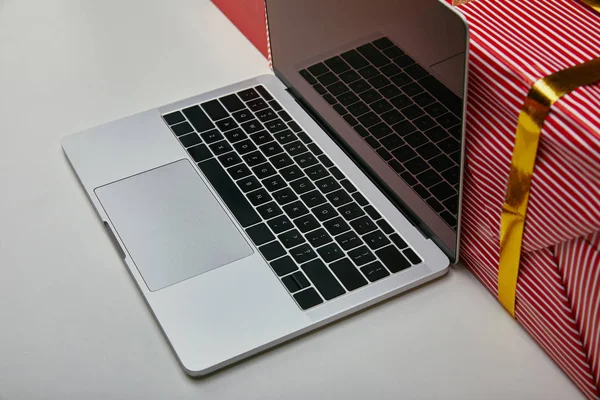 Cropped view of opened laptop with black laptop keyboard — Stock Photo