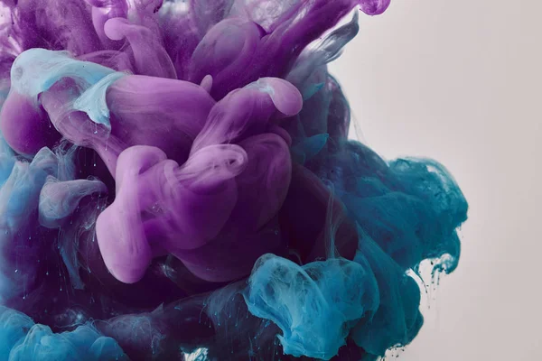 Abstract background with purple and blue swirls of paint — Stock Photo