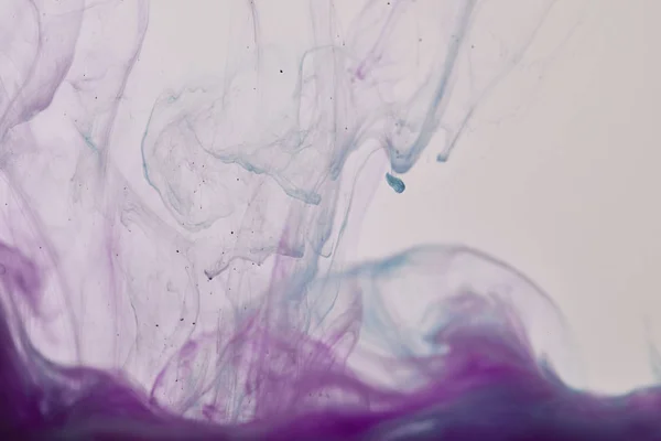 Abstract texture with purple and blue swirls of paint — Stock Photo