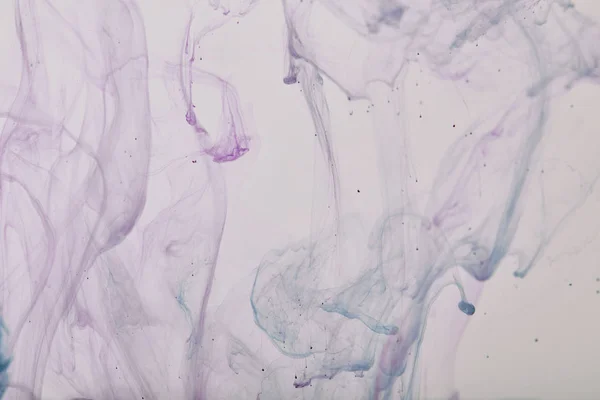 Motif abstrait avec des tourbillons violets et bleus de peinture — Photo de stock