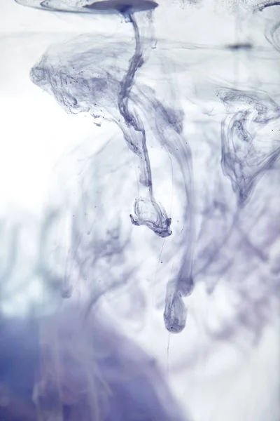 Creative background with abstract violet swirls of paint — Stock Photo