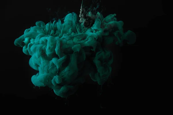Abstract dark wallpaper with green splash of paint — Stock Photo