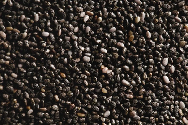 Primer plano de semillas de chía como fondo texturizado con espacio de copia - foto de stock