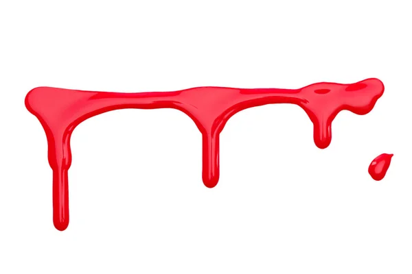 Крупным планом вид ярко-красного капающего лака для ногтей, изолированного на белом — стоковое фото