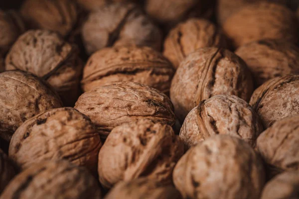 Plein cadre de noix savoureuses comme fond — Photo de stock