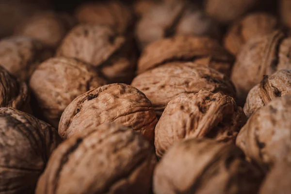 Plein cadre de noix savoureuses comme fond — Photo de stock