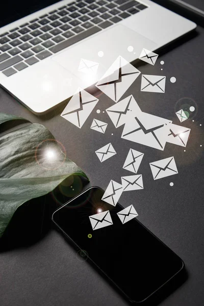 Smartphone with blank screen and Email icons — Stock Photo
