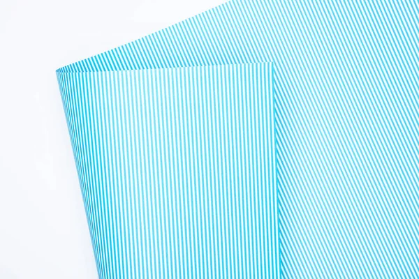 Elevated view of striped paper isolated on white — Stock Photo