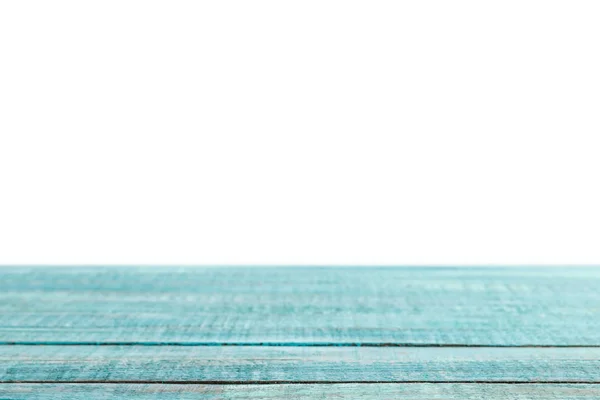 Turquoise grungy striped wooden tabletop on white — Stock Photo