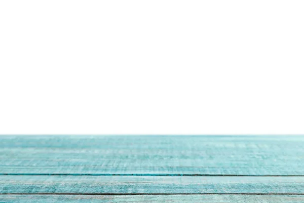 Mesa de madera a rayas gruesas turquesa sobre blanco - foto de stock