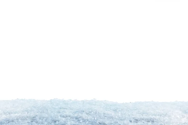 Nieve azul claro sobre fondo blanco, invierno - foto de stock