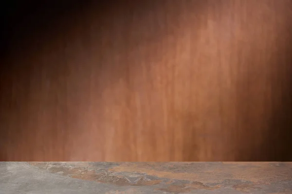 Selective focus of textured table with wooden wall on background — Stock Photo