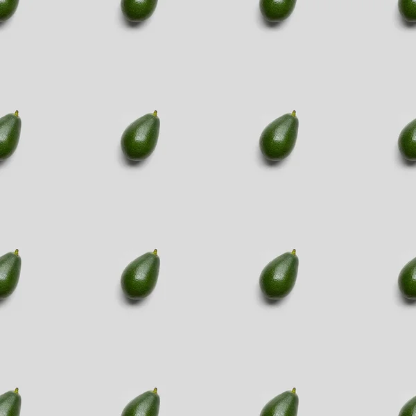 Collage aus Avocados auf grauem Hintergrund, nahtloses Hintergrundmuster — Stockfoto