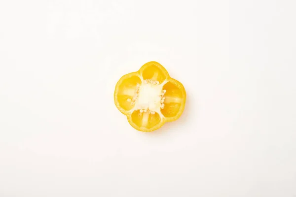 Studio shot of cut yellow bell pepper on white background — Stock Photo