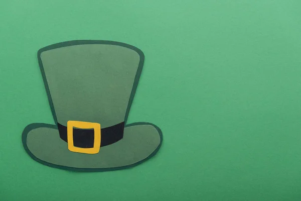 Top view of paper hat isolated on green with copy space, st patrick day concept — Stock Photo