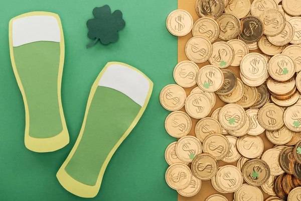 Top view of golden coins with dollar signs, shamrock and paper beer glasses, st patrick day concept — Stock Photo