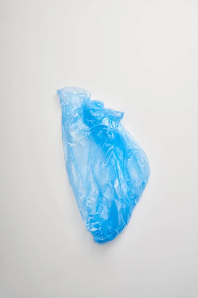 Top view of blue garbage bag on white background — Stock Photo