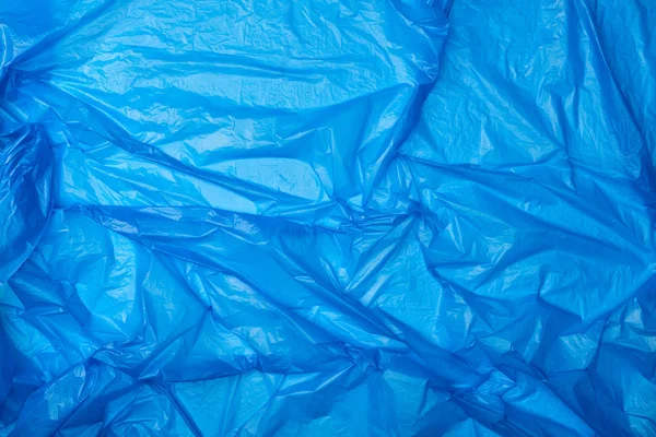 Top view of blue crumpled polyethylene bag — Stock Photo