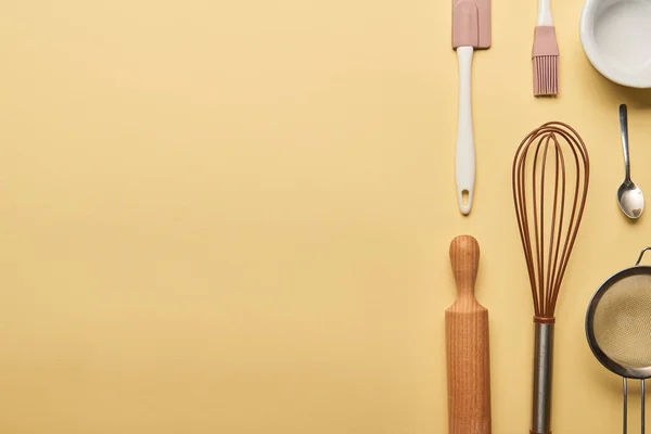 Flat lay with cooking utensils on yellow background with copy space — Stock Photo