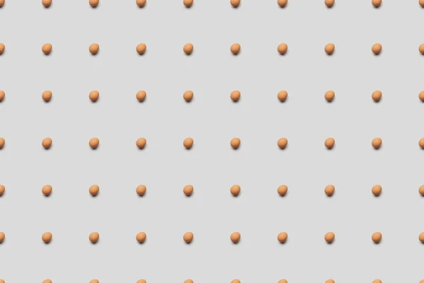 Organic brown eggs on grey background, seamless pattern — Stock Photo