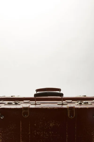 Vintage brown suitcases with copy space isolated on grey — Stock Photo