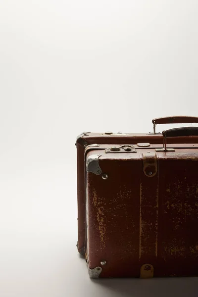 Brown suitcases with copy space isolated on grey — Stock Photo