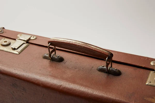 Close up of vintage brown suitcase isolated on grey — Stock Photo