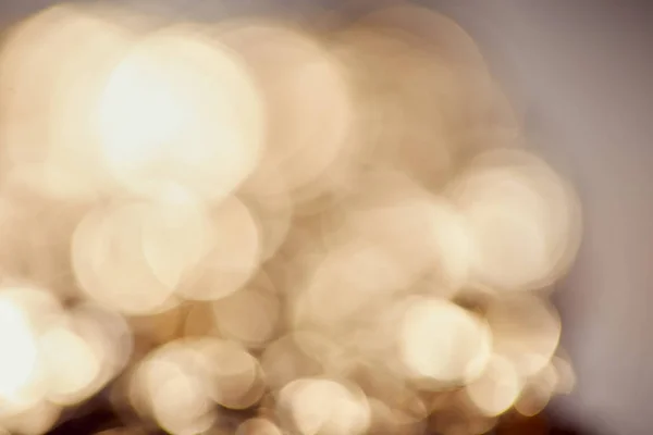Cintilantes brilhantes e cintilantes sobre fundo cinza — Fotografia de Stock