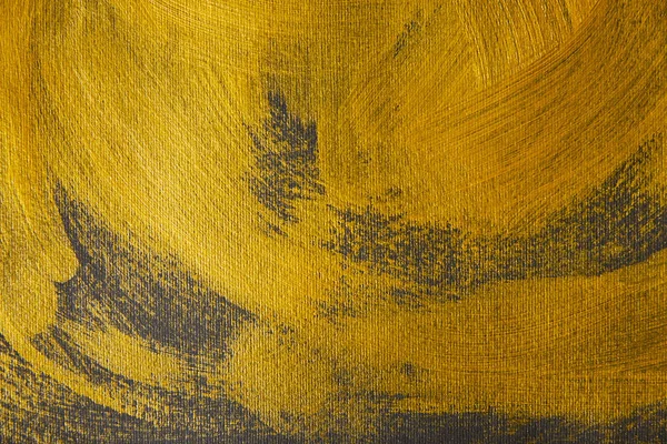 Different golden brushstrokes drawn on grey background — Stock Photo