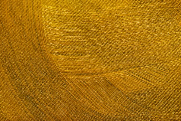 Pennellate diverse ygolden disegnate su tela grigia — Foto stock