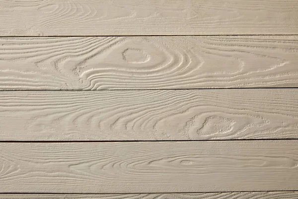 Top view of white desk surface with wooden texture — Stock Photo