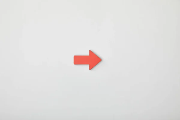 Top view of red horizontal pointer on grey background — Stock Photo