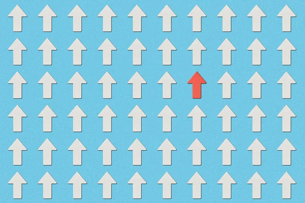 Top view of rows with white pointers and red arrow on blue background — Stock Photo