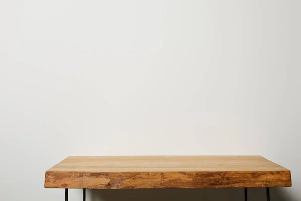 Textured wooden brown table at home — Stock Photo